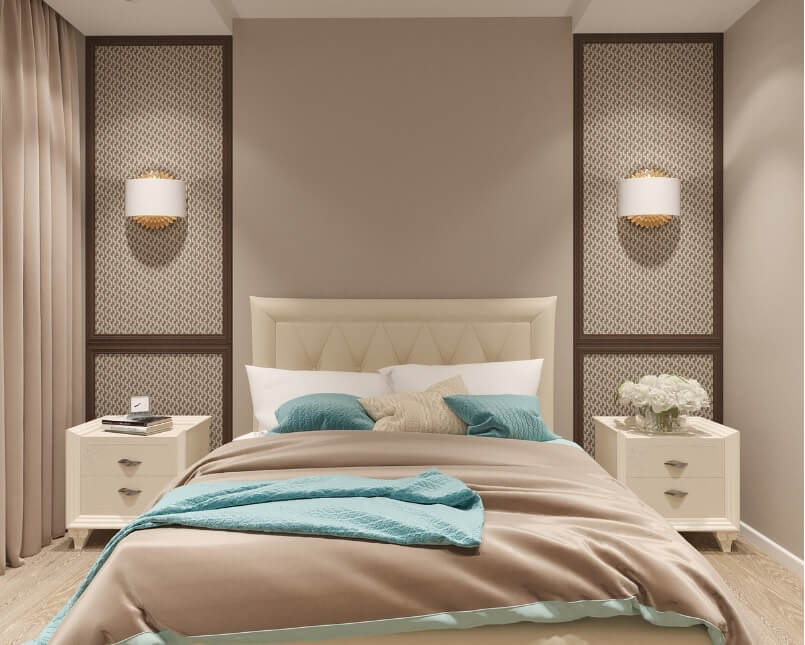 흰색 풍의 잘 정돈된 침실의 모습으로 민트색의 베개가 놓여있다.